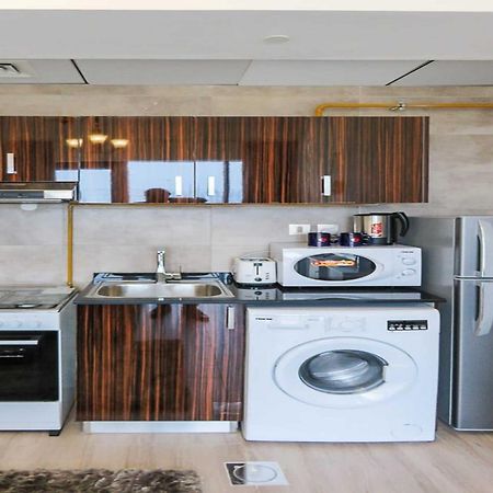 Oyo 860 Studio Apartment, Maya Tower 4, Jumeirah Village Triangle Dubai Eksteriør billede