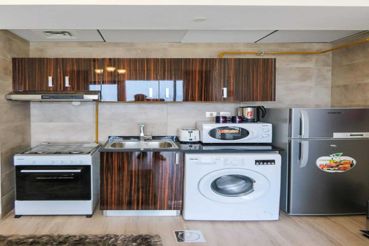Oyo 860 Studio Apartment, Maya Tower 4, Jumeirah Village Triangle Dubai Eksteriør billede
