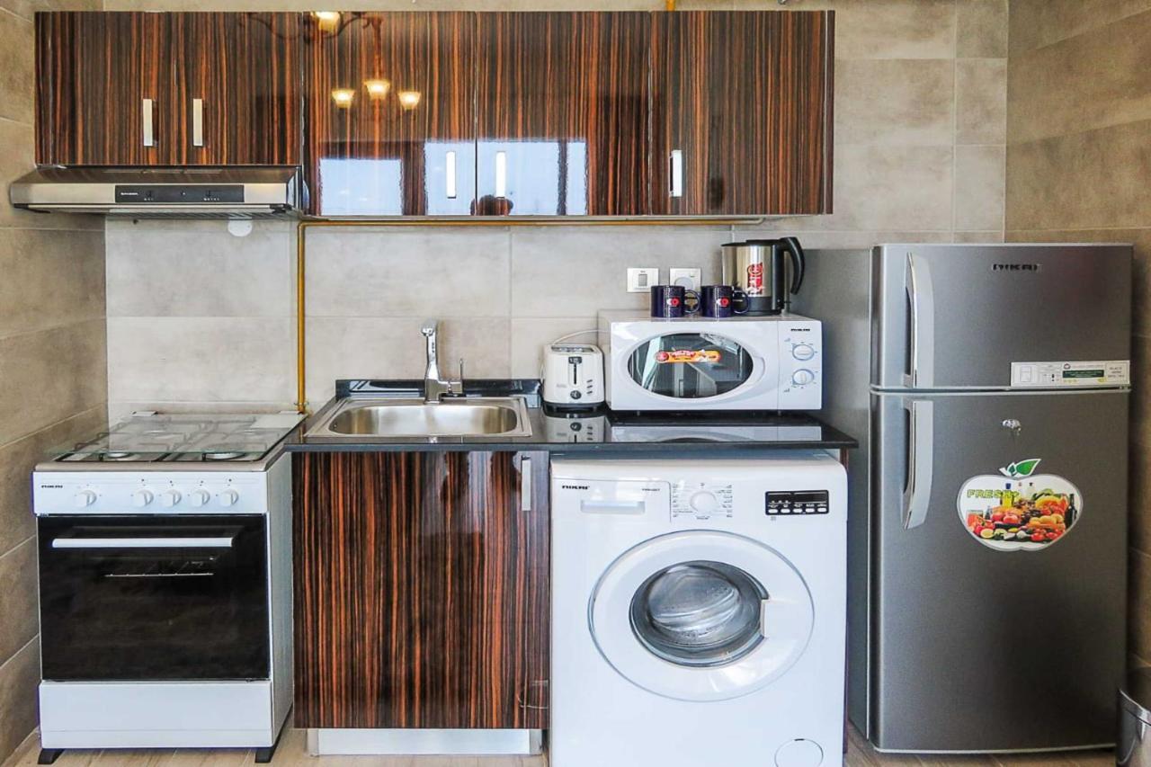 Oyo 860 Studio Apartment, Maya Tower 4, Jumeirah Village Triangle Dubai Eksteriør billede