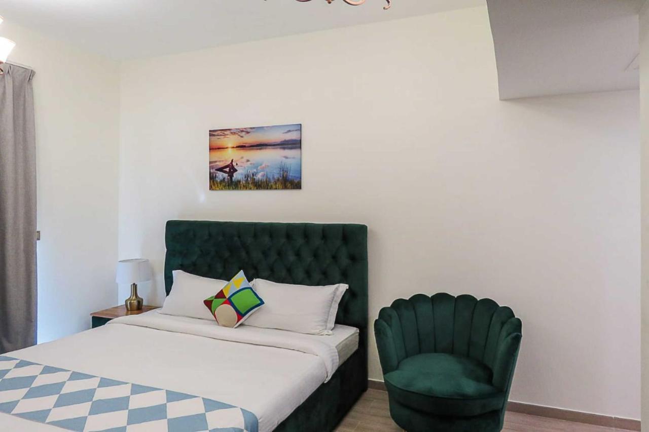 Oyo 860 Studio Apartment, Maya Tower 4, Jumeirah Village Triangle Dubai Eksteriør billede