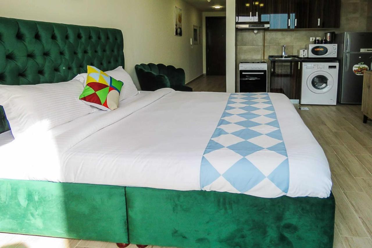 Oyo 860 Studio Apartment, Maya Tower 4, Jumeirah Village Triangle Dubai Eksteriør billede