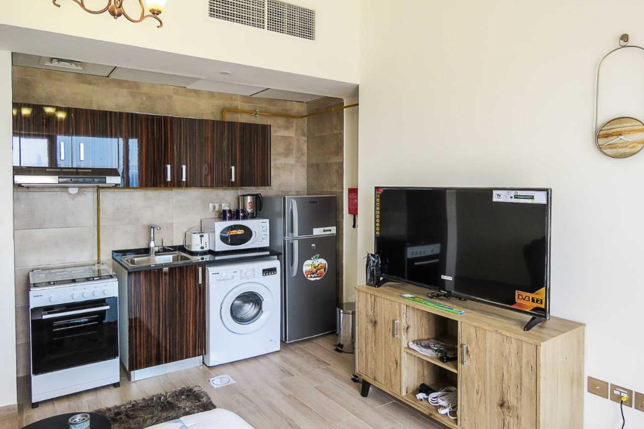 Oyo 860 Studio Apartment, Maya Tower 4, Jumeirah Village Triangle Dubai Eksteriør billede