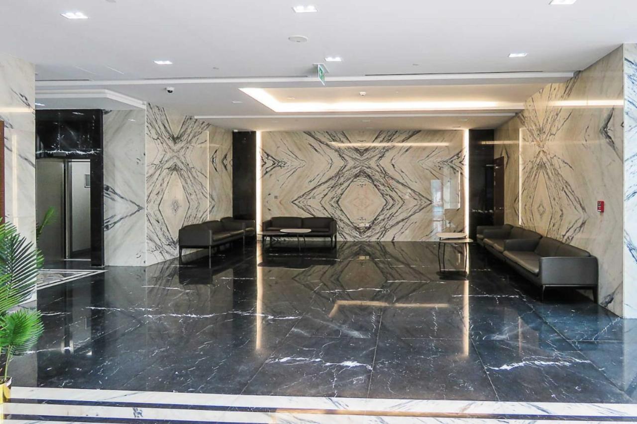 Oyo 860 Studio Apartment, Maya Tower 4, Jumeirah Village Triangle Dubai Eksteriør billede