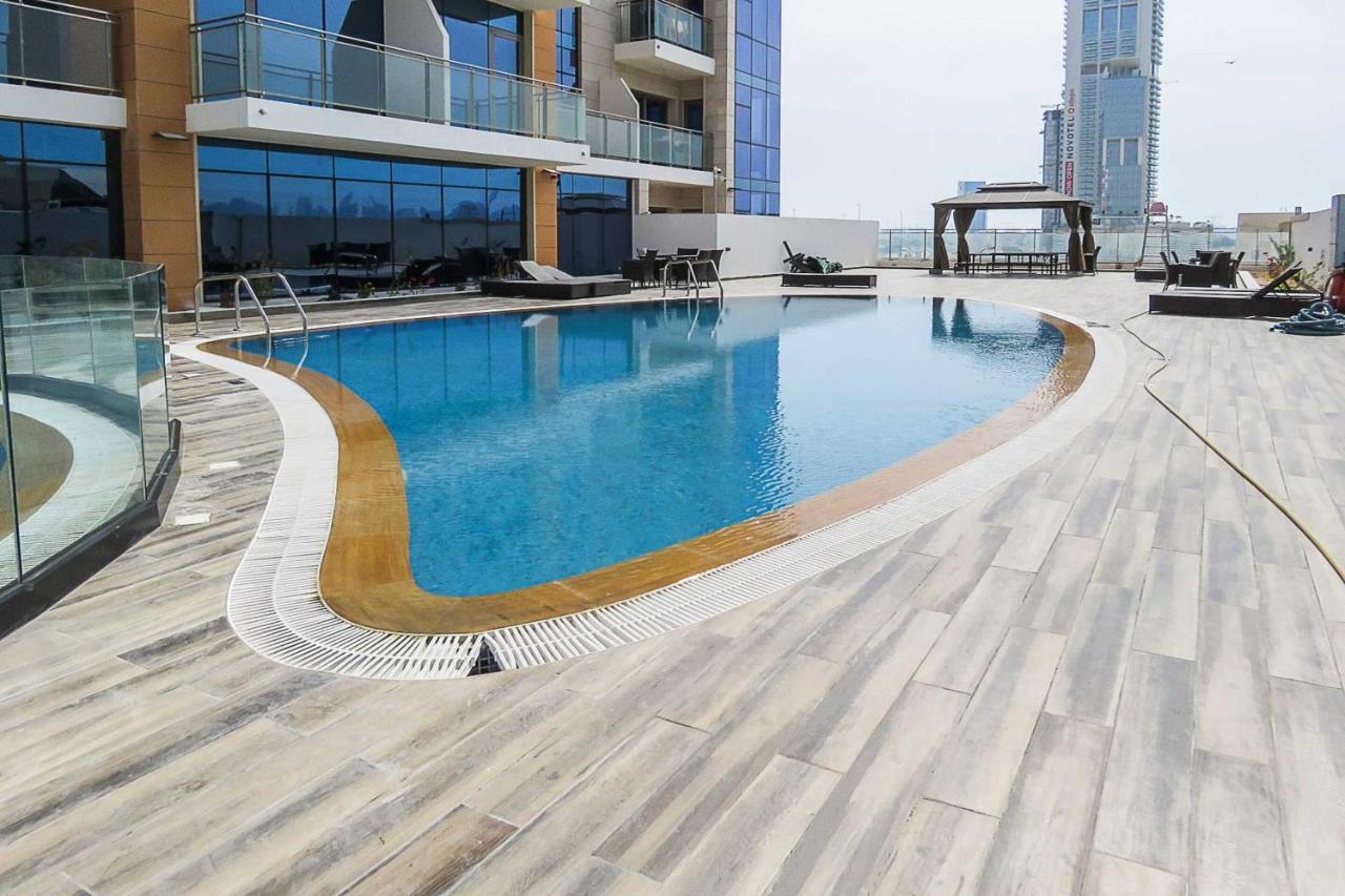 Oyo 860 Studio Apartment, Maya Tower 4, Jumeirah Village Triangle Dubai Eksteriør billede