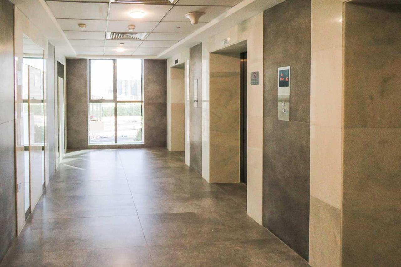 Oyo 860 Studio Apartment, Maya Tower 4, Jumeirah Village Triangle Dubai Eksteriør billede