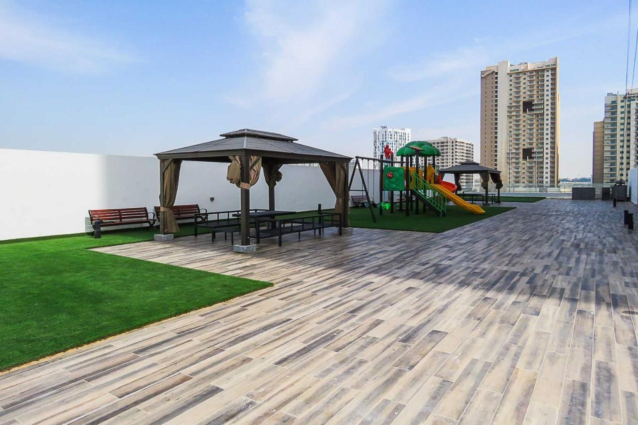 Oyo 860 Studio Apartment, Maya Tower 4, Jumeirah Village Triangle Dubai Eksteriør billede